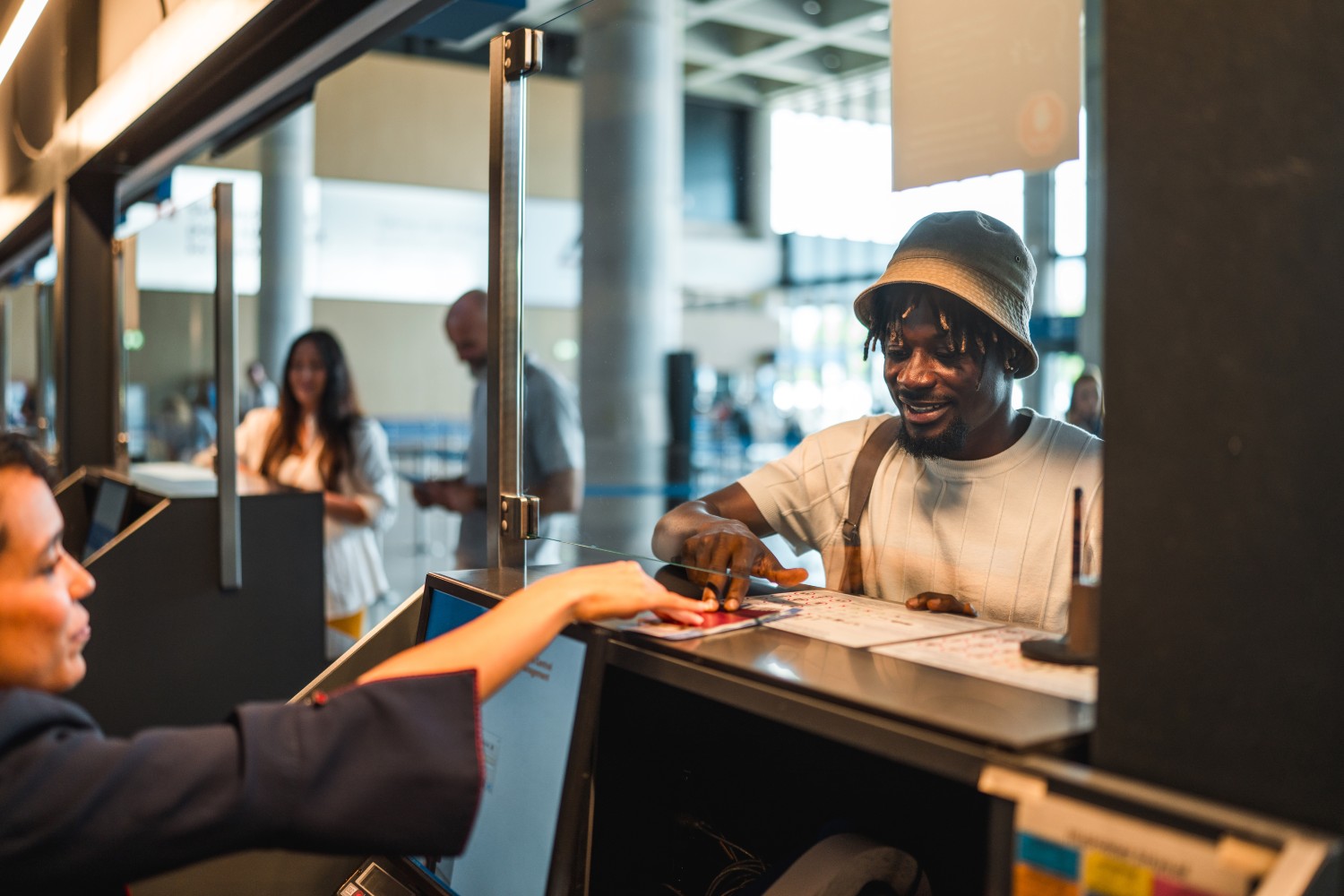 Man showing his passport while traveling