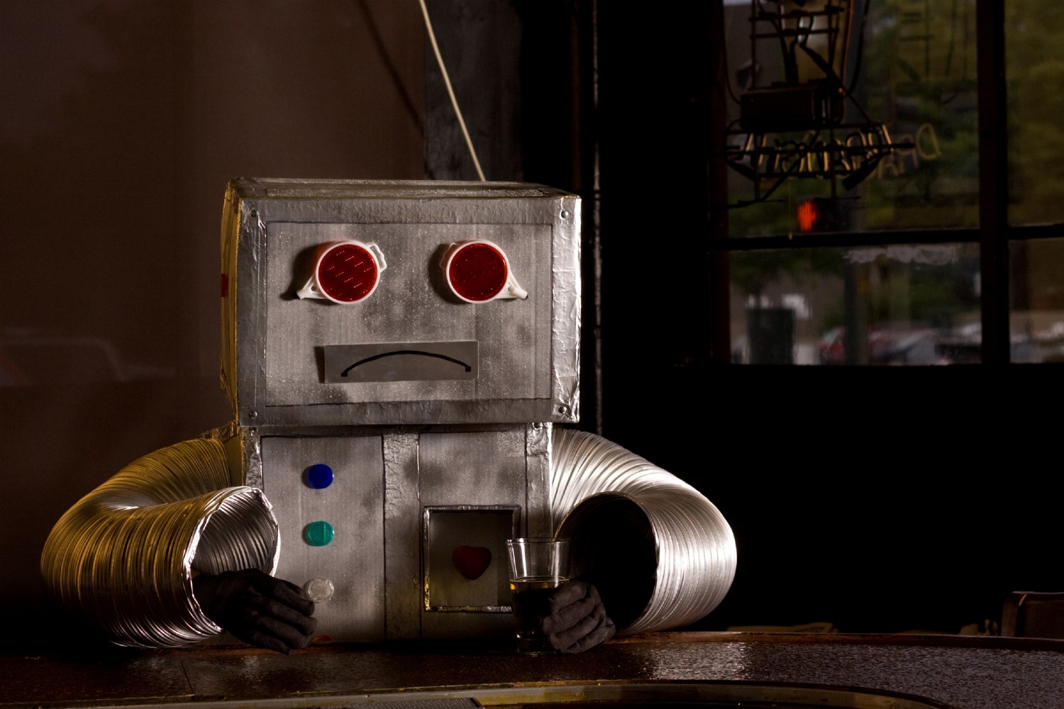 Robot drinking at the bar