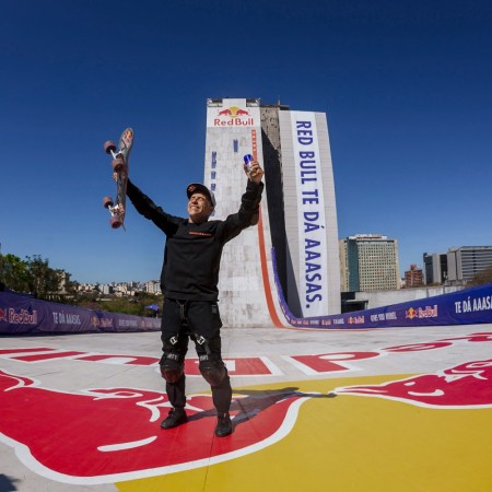 Sandro Dias after skating down the side of a building
