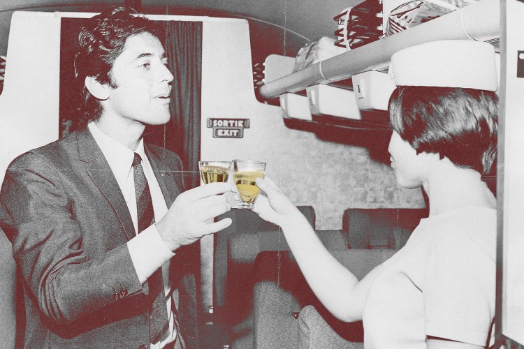 A man and a woman clinking glasses on a plane, vintage