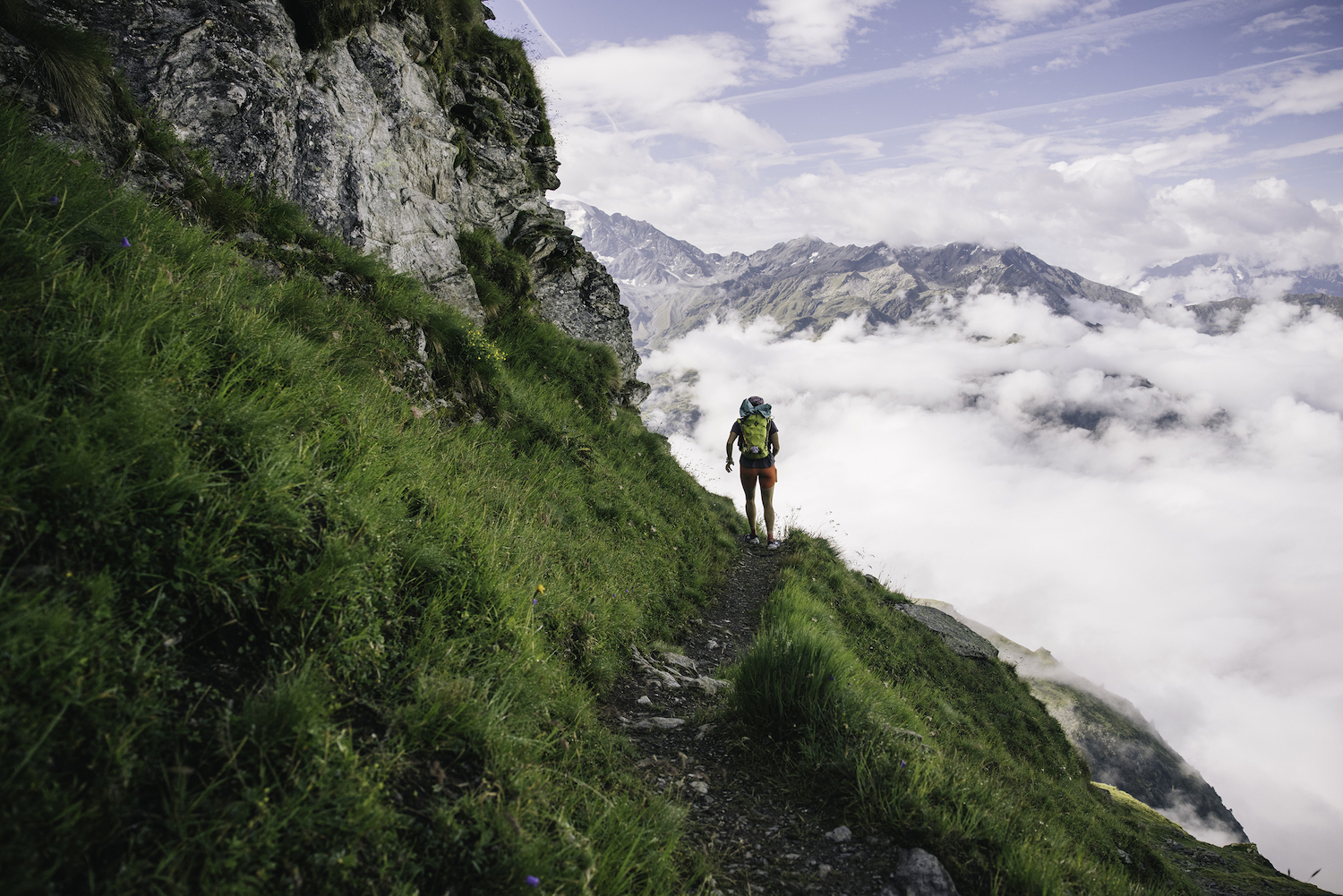 A man running in the Swiss Alps.
