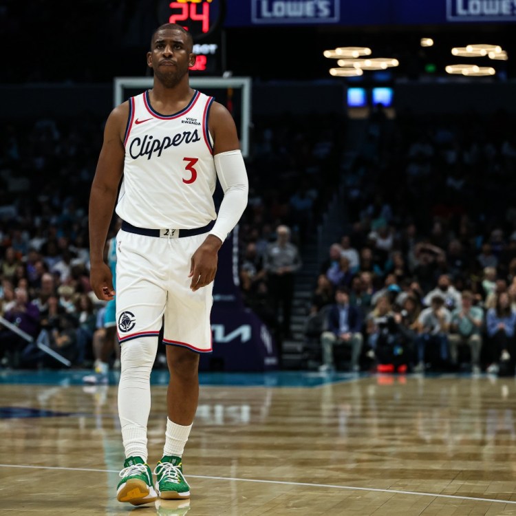 Chris Paul walking on a basketball court