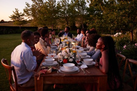 People eating at a shared table