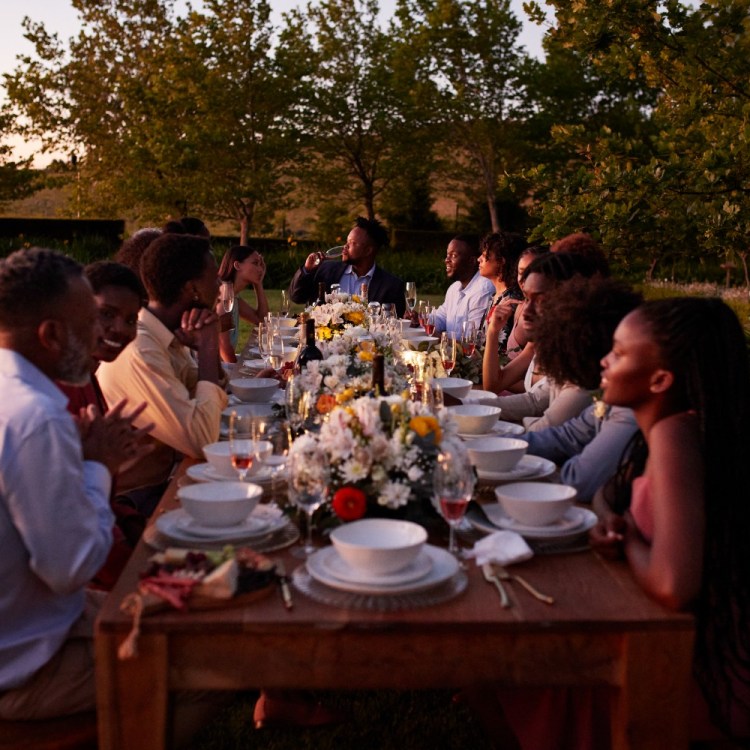 People eating at a shared table