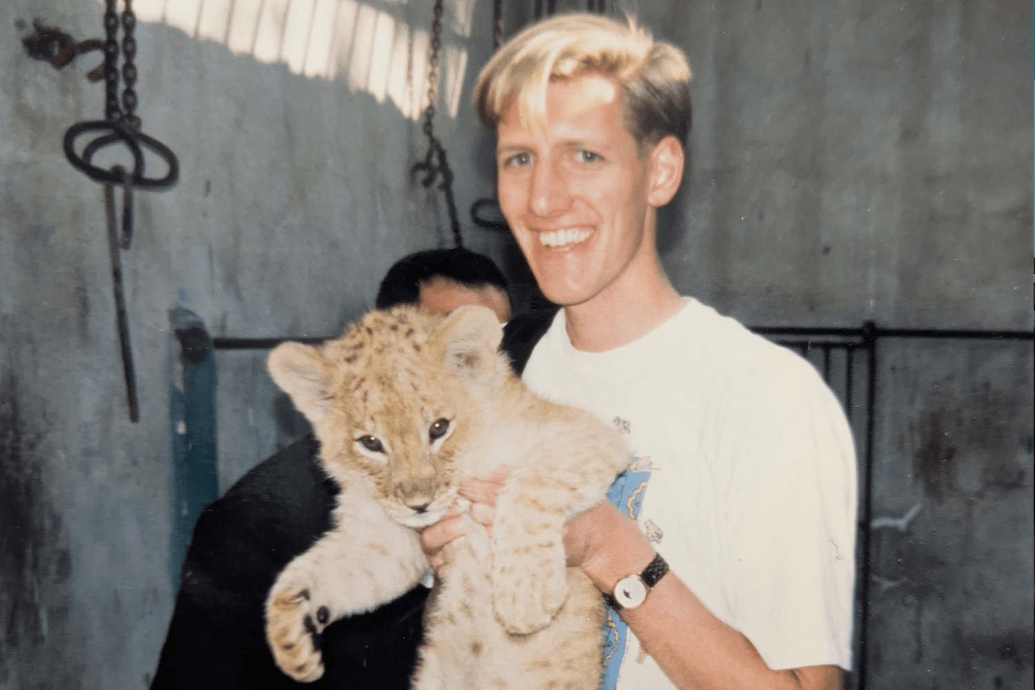 A little baksheesh in exchange for holding a lion cub at the Cairo Zoo