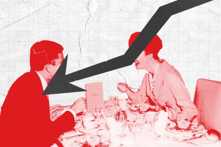 A man and a woman sitting down to dinner in a photo illustration with a downward trending arrow