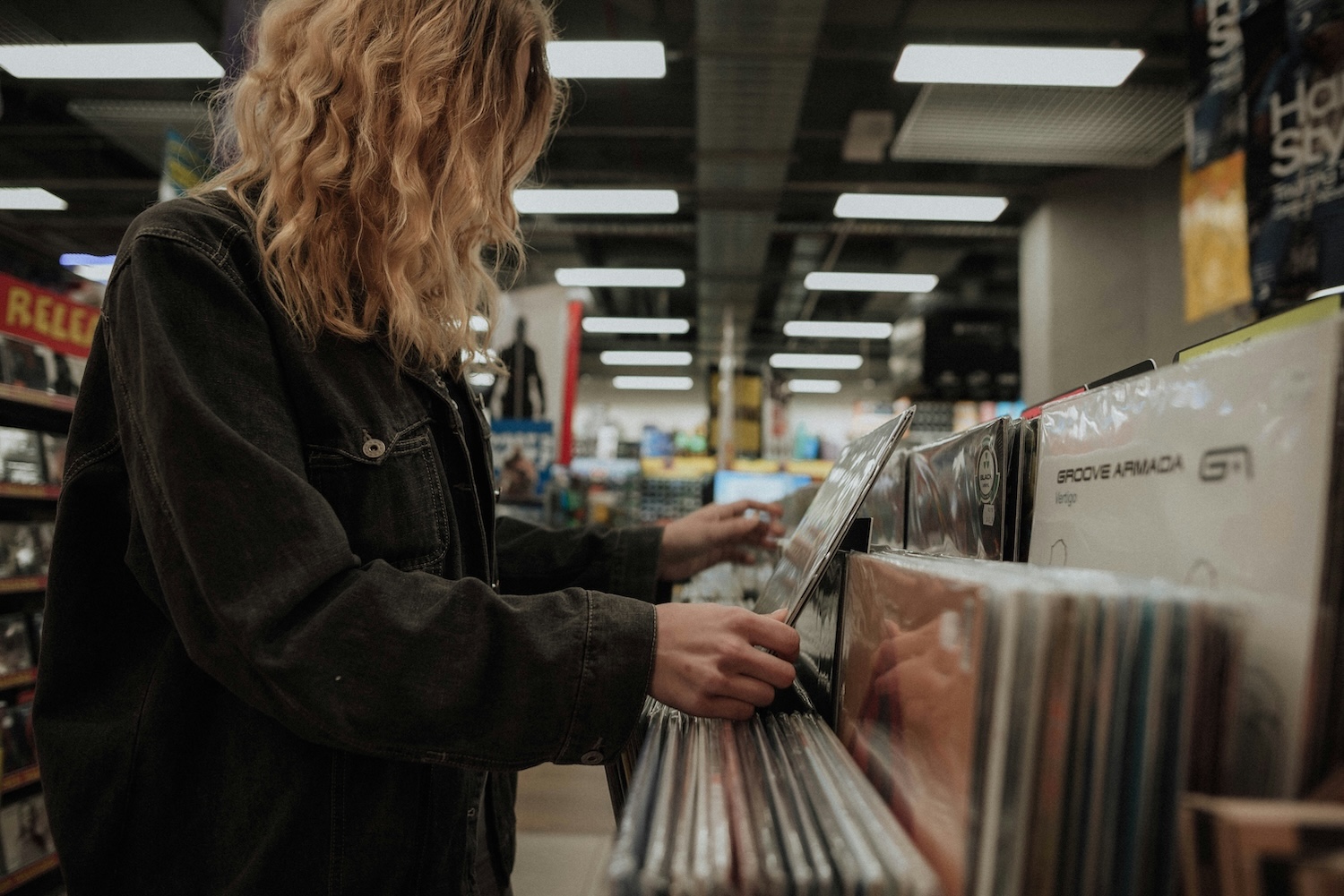 A woman looking through records