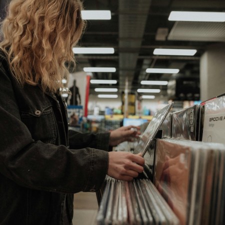 A woman looking through records