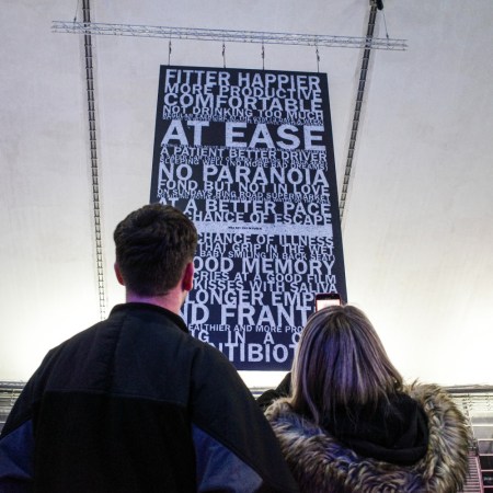 Radiohead fans looking up at a banner