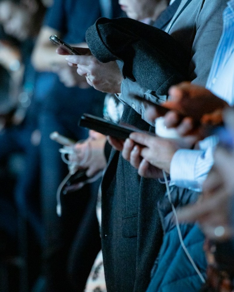 People on smartphones