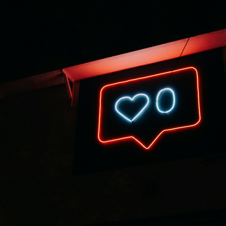 Neon social media sign