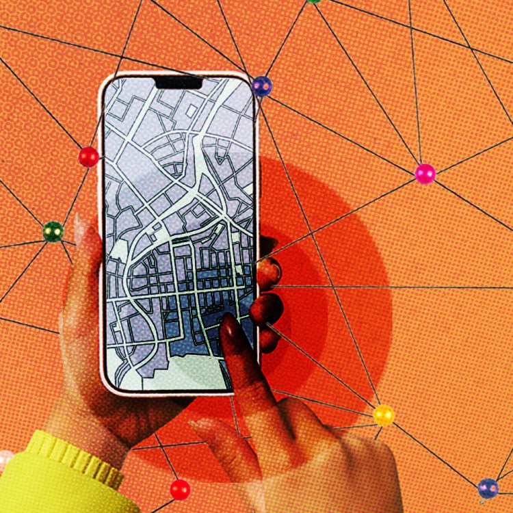 a person holding their phone, looking a map