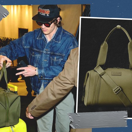 Connor Storrie carries the Dagne Dover Landon Carryall in New York City