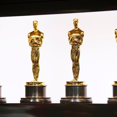 Academy Awards trophies in a line. We look at the biggest snubs and surprises from the 2026 Oscar nominations.