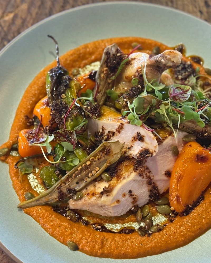 An airline chicken breast with romesco sauce and mini bell peppers, from The Ranch at Rock Creek. I got the recipe.