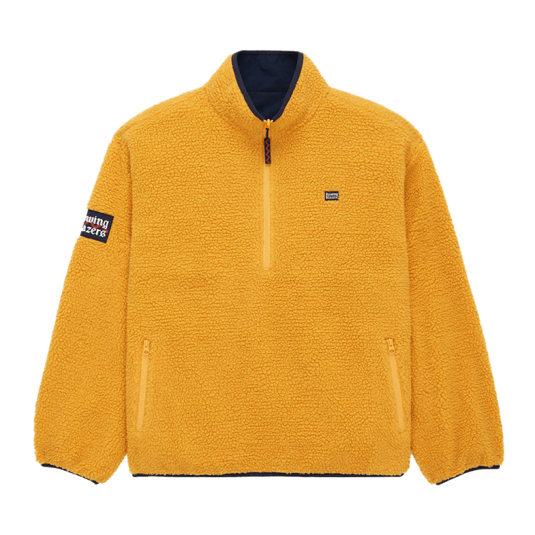 Stand Out and Stay Warm with This Sherpa Half Zip