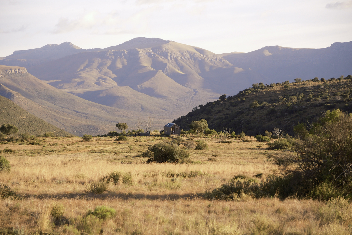 A hut in front of South Africa's Mount Camdeboo.