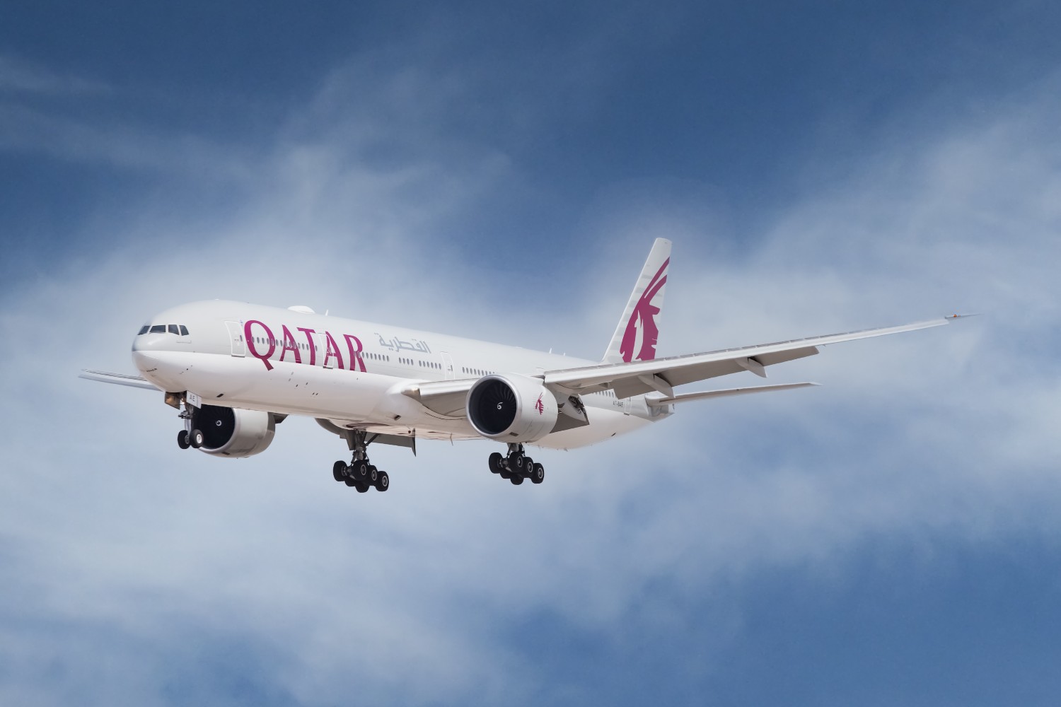Qatar Airways plane in flight