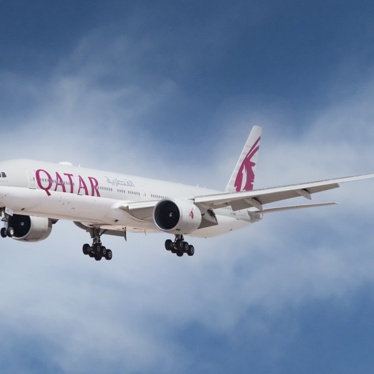 Qatar Airways plane in flight