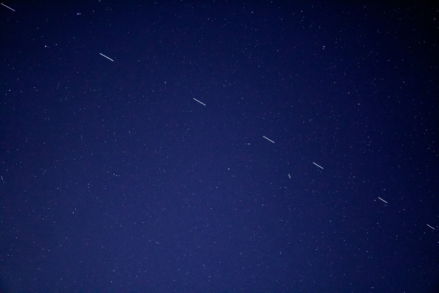 Satellites in the night sky. Experts are warning about the growing risks space junk poses to air travel.