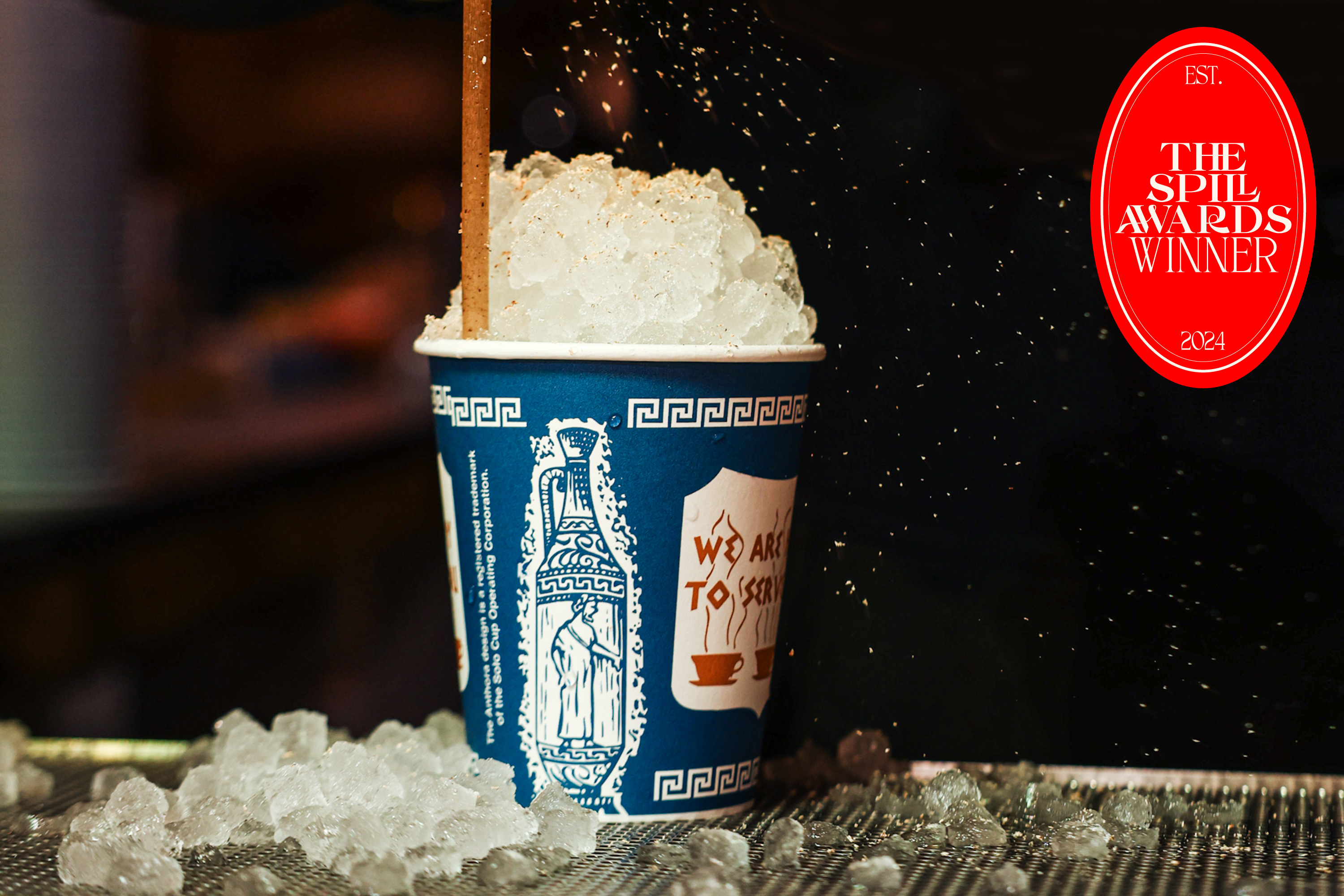 Bar Snack Guinness Eggnog cocktail in blue paper cup