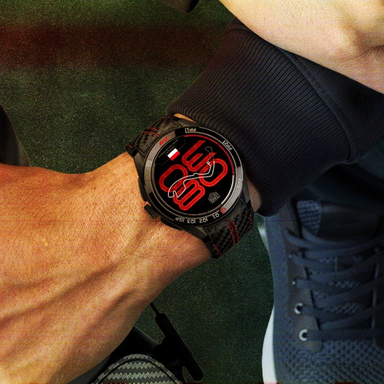 The TAG Heuer Connected Calibre E5 x Formula 1 Edition watch on a man's wrist