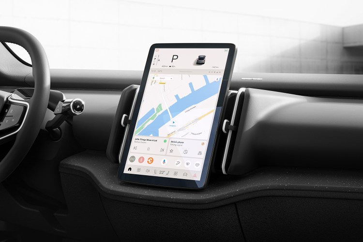 A photo of a large tablet that acts as the center display inside a modern vehicle