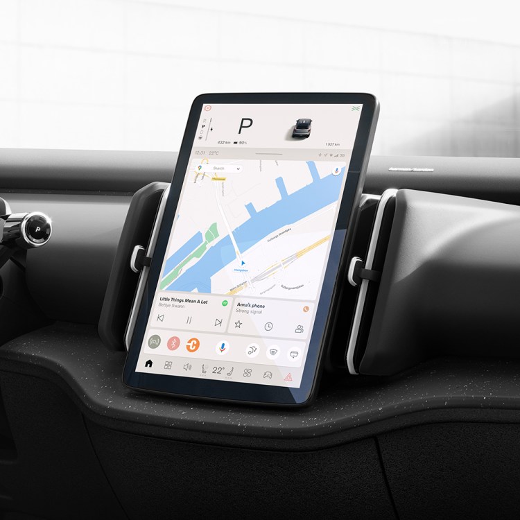 A photo of a large tablet that acts as the center display inside a modern vehicle