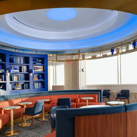A seating area inside the JetBlue BlueHouse lounge at JFK Airport in New York