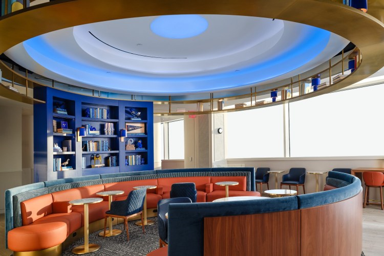 A seating area inside the JetBlue BlueHouse lounge at JFK Airport in New York