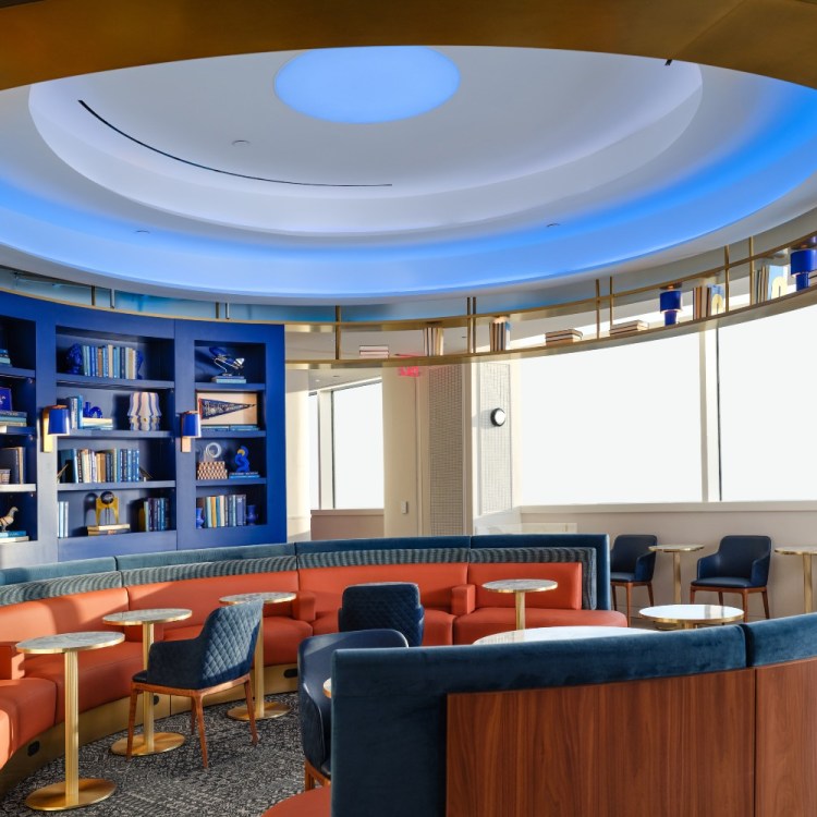 A seating area inside the JetBlue BlueHouse lounge at JFK Airport in New York