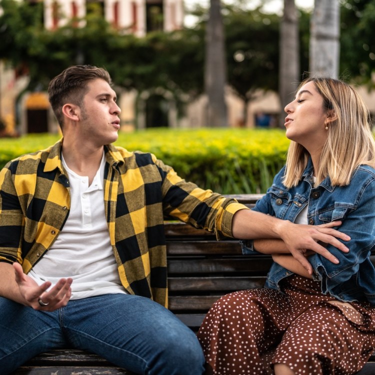 Young couple having an argument outdoors