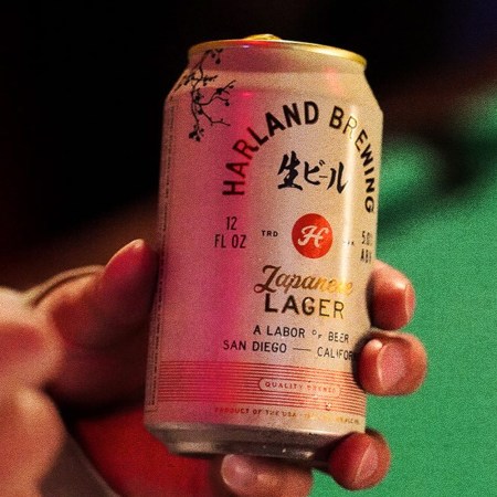hand holding a can of Harland Japanese Lager