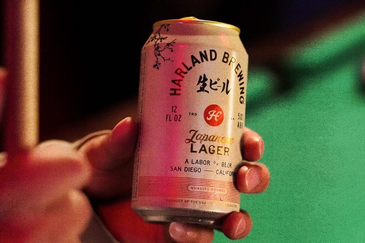 hand holding a can of Harland Japanese Lager