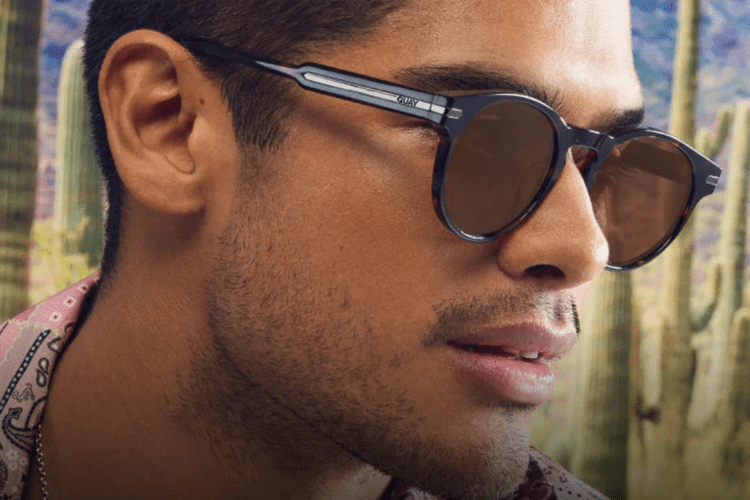lifestyle image from Quay of man wearing sunglasses