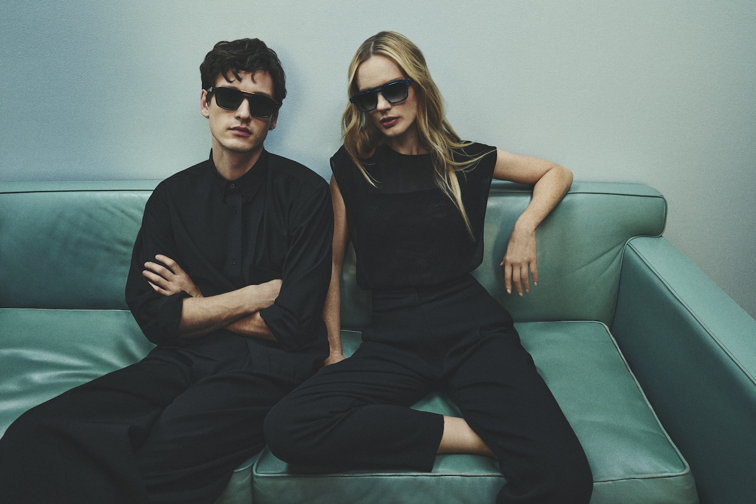 A man and a woman wearing Robert Marc eyewear from the first collection by John Juniper and Jeff Solorio