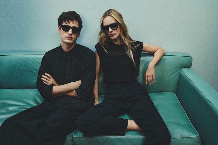 A man and a woman wearing Robert Marc eyewear from the first collection by John Juniper and Jeff Solorio