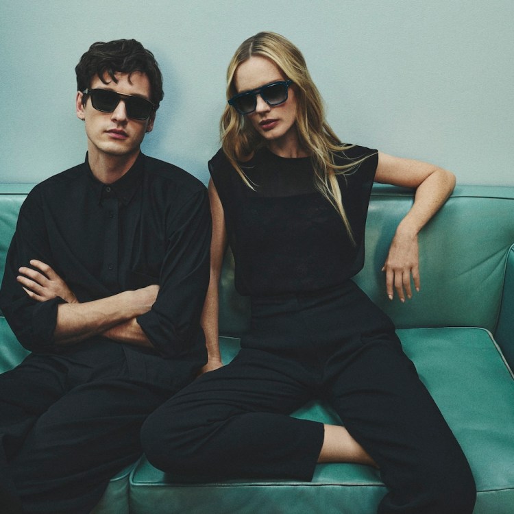 A man and a woman wearing Robert Marc eyewear from the first collection by John Juniper and Jeff Solorio