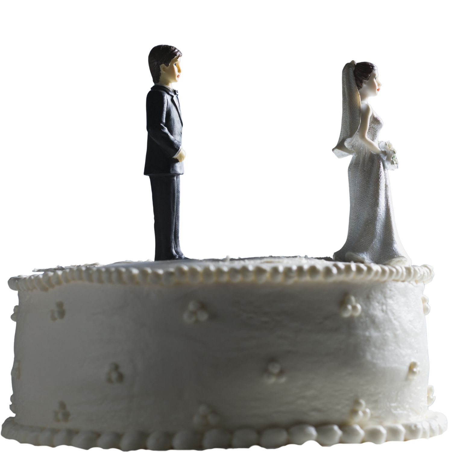 Wedding cake with wedding bride facing away from groom toppers