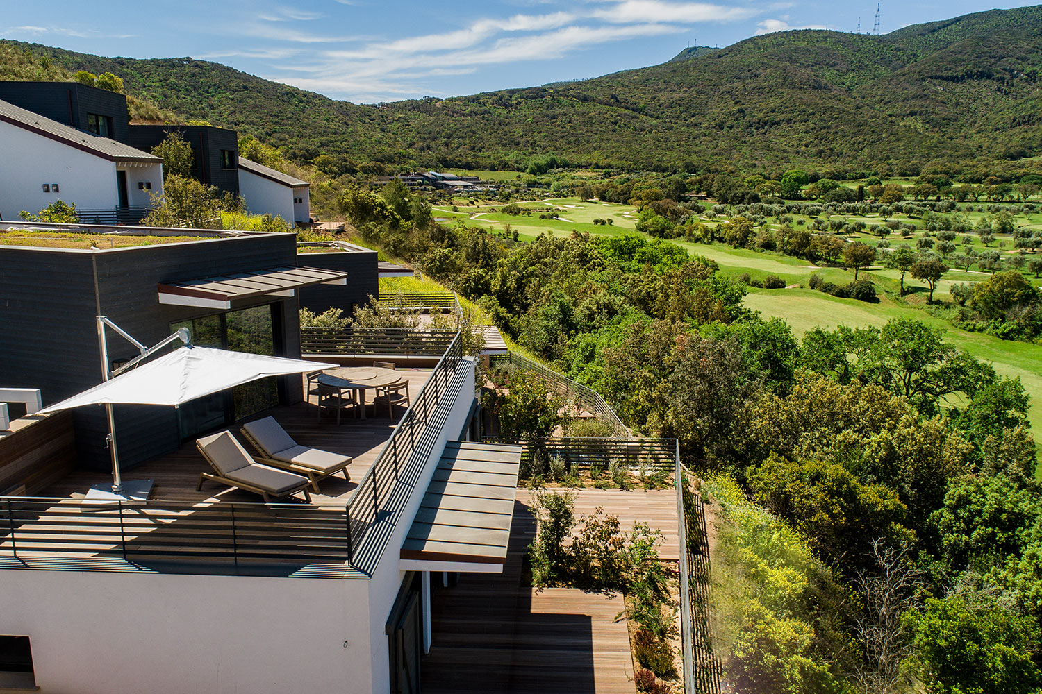 The golf villas at Argentario, a resort and residential community in Tuscany, Italy, overlooking the golf course