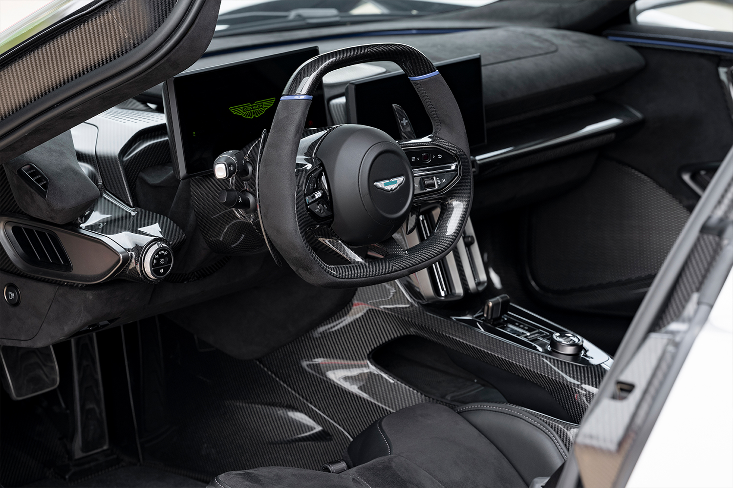 The driver's seat and dashboard inside the Aston Martin Valhalla, with an F1-inspired seating position