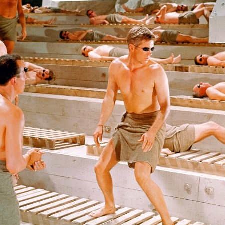 A bunch of men in a sauna at a bachelor party weekend