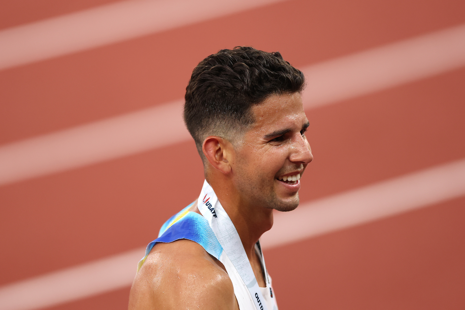 A headshot of Grant Fisher.