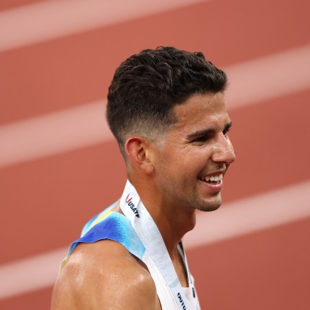 A headshot of Grant Fisher.