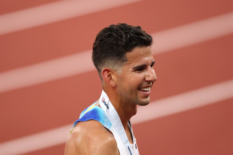 A headshot of Grant Fisher.