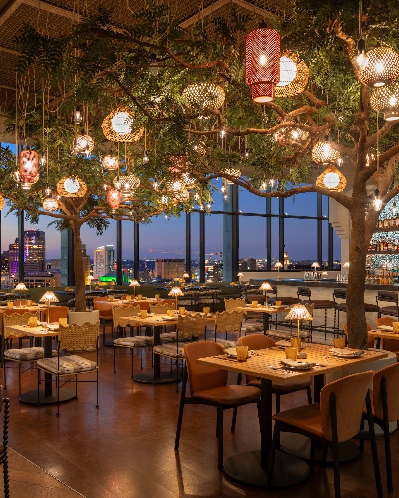 Inside the Monarch San Antonio; a dining room with elaborate lighting