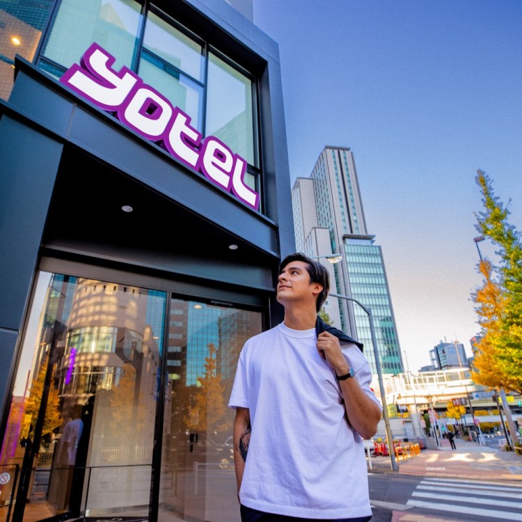 Man outside a Yotel building