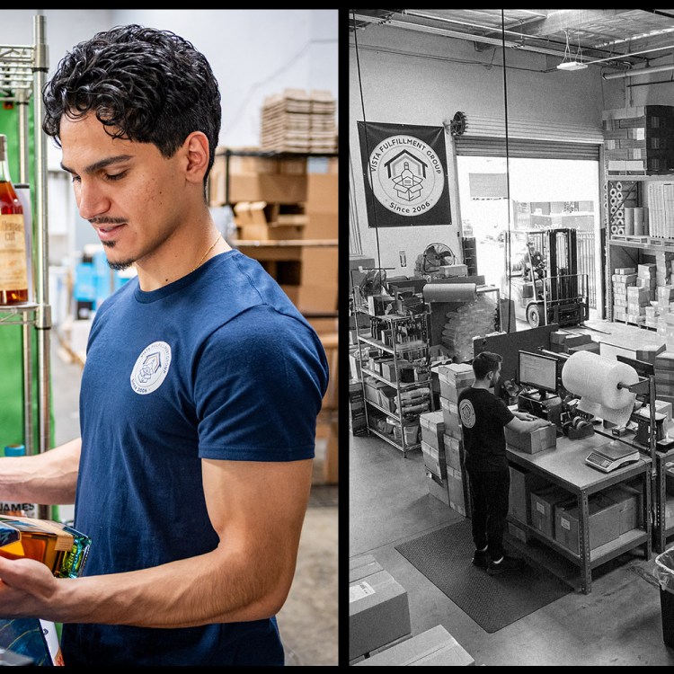 A man at Vista Fulfillment Group putting together a package with booze