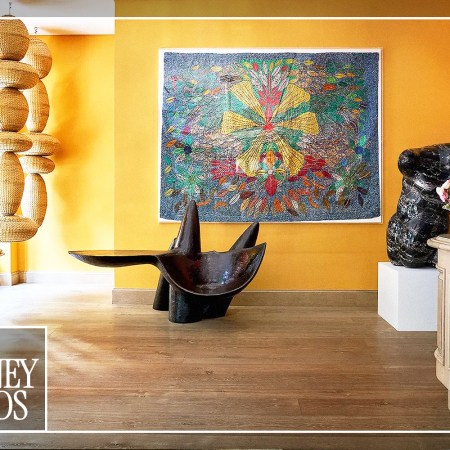 A communal interior space at a Firmdale hotel in New York City, showcasing curated, vibrant art and design details.