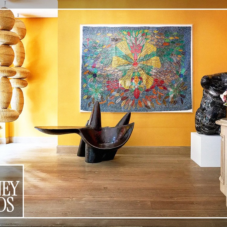 A communal interior space at a Firmdale hotel in New York City, showcasing curated, vibrant art and design details.